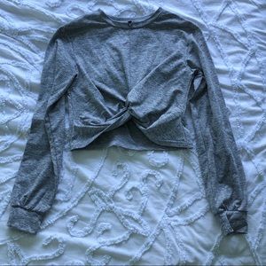 Grey cropped long sleeve top with knot front